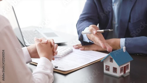 Home and real estate brokerage agents are talking to clients to explain details of the housing they are interested in buying, provide detailed information on home projects and take home mortgage loans