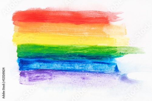 Rainbow pride flag hand painted with watercolors isolated on white canvas paper. LGBT Rainbow flag background