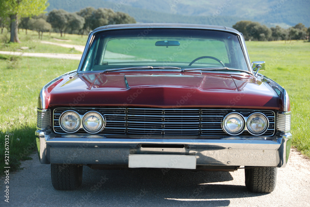 Vintage car parked on the countryside near Segovia, Spain.