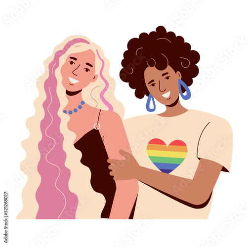 Two lesbian girls smile and hug. Interracial lgbt, rainbow flag and gay love