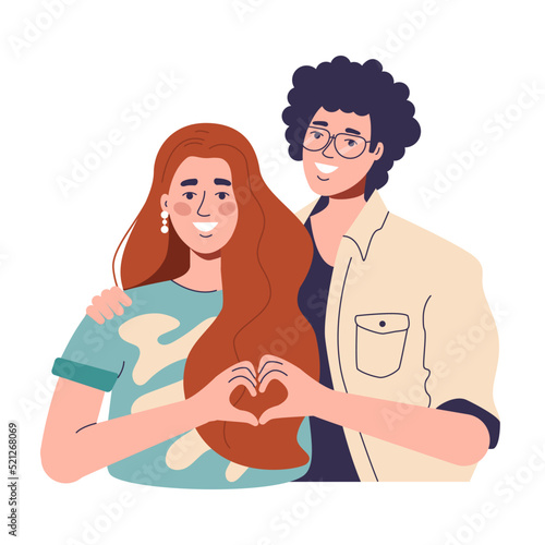 a red-haired woman and a curly-haired guy love and show their hearts with their hands. happy couple married and happy