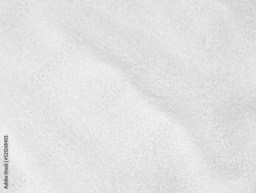 White clean wool texture background. light natural sheep wool. white seamless cotton. texture of fluffy fur for designers. close-up fragment white wool carpet... © Sittipol 