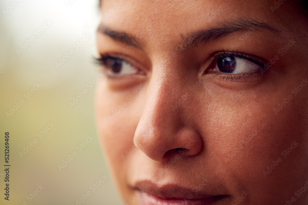 Close Up Of Smiling Eyes Of Woman Looking Out Of Window Close Up Of Smiling Eyes Of Woman Looking Out Of Window