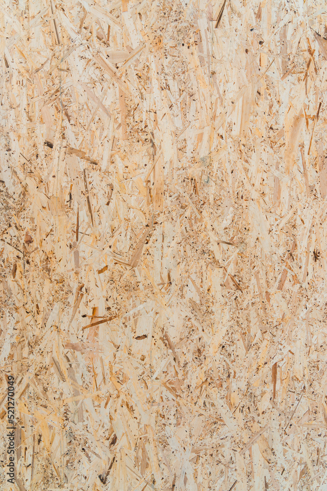Yellow OSB plate texture, vertical photo Yellow OSB plate texture, vertical photo