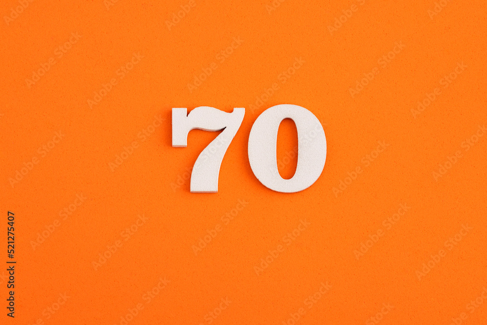 Number 70 - On orange foam rubber background Number 70 - On orange foam rubber background
