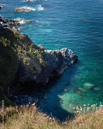 Rocky cliff and bay with turquoise water