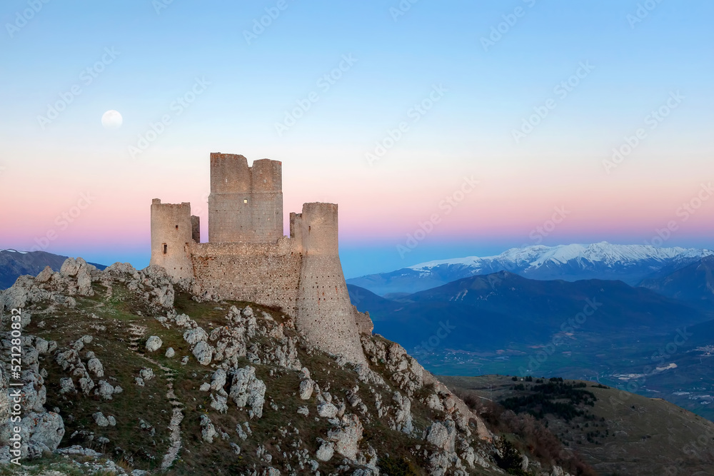 Rocca Calascio, an ancient Italian castle. Old castle in ruins, perched on the rocks of the Abruzzo mountains in Italy. Evocative and fantastic place