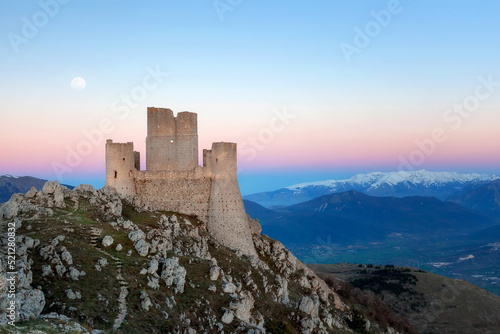 Rocca Calascio, an ancient Italian castle. Old castle in ruins, perched on the rocks of the Abruzzo mountains in Italy. Evocative and fantastic place photo