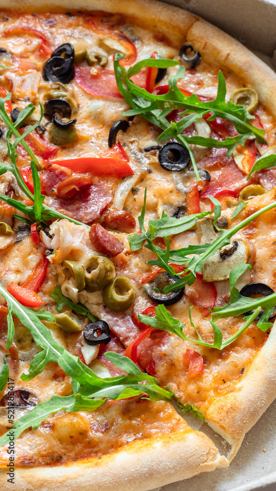 Delicious fresh pizza close-up. Texture of delicious hot pizza ready to eat Delicious fresh pizza close-up. Texture of delicious hot pizza ready to eat