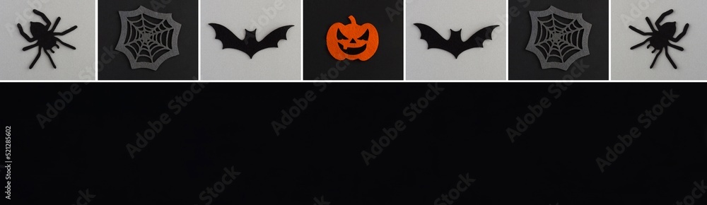 Naklejka premium Banner for Halloween. Decorative spiders, pumpkins, spider web and bat on the black and gray background. Copy space. Top view.