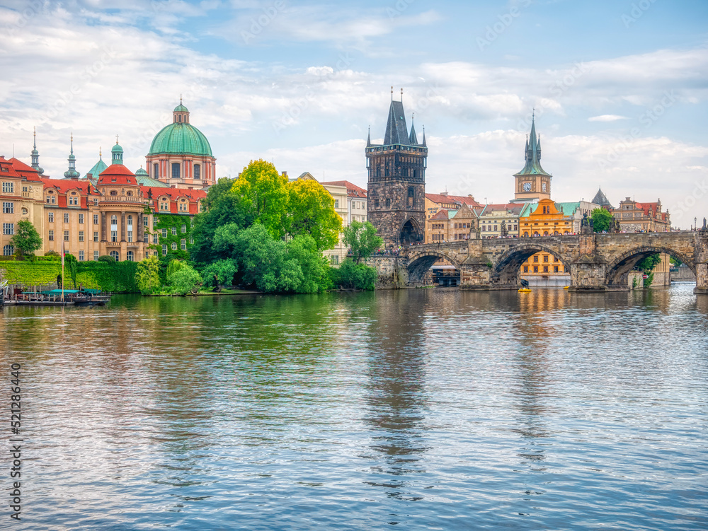  View with the Charles Bridge main touristic attraction . Medieval stone arch bridge over Vltava river in Prague