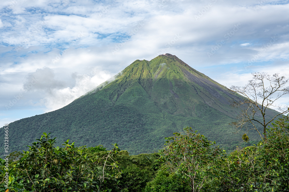 Costa Rica, The Volcano Arenal surrounded by the tropical forest 