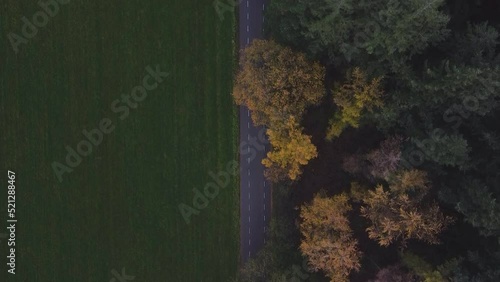 Top view of a road near a field and oak trees in Bennekom, Ede, Gelderland, The Netherlands photo