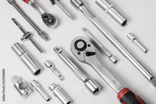 Open-end wrenches of various sizes with various hexagonal sockets. Composition on a white background