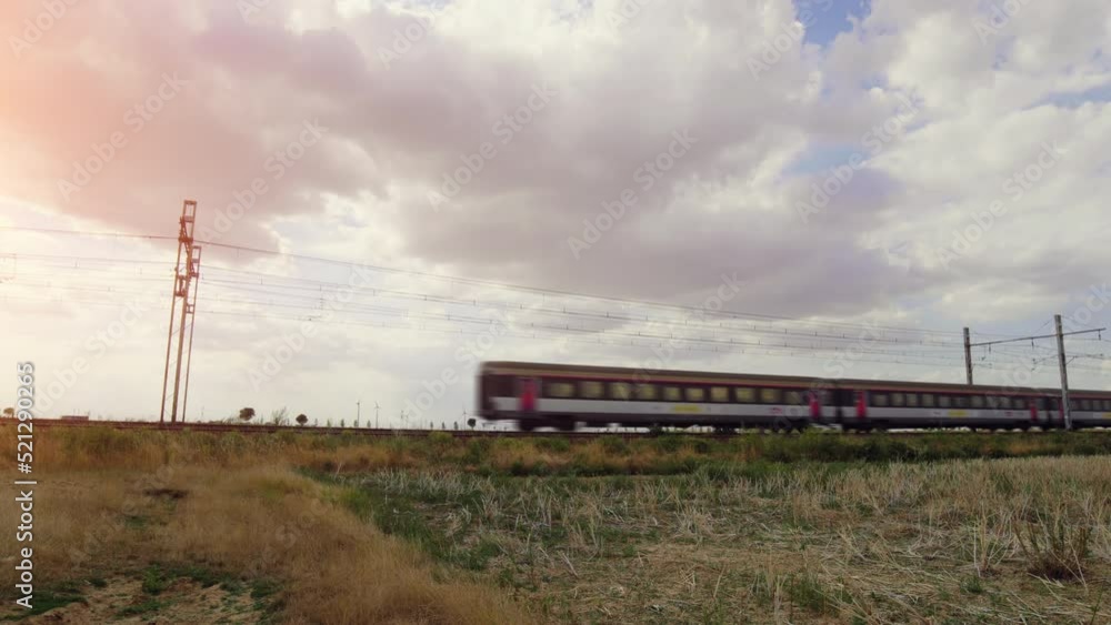 Modern high speed train. High speed passenger railway train. Passenger train running in the countryside. Modern high speed train. High speed passenger railway train. Passenger train running in the countryside.