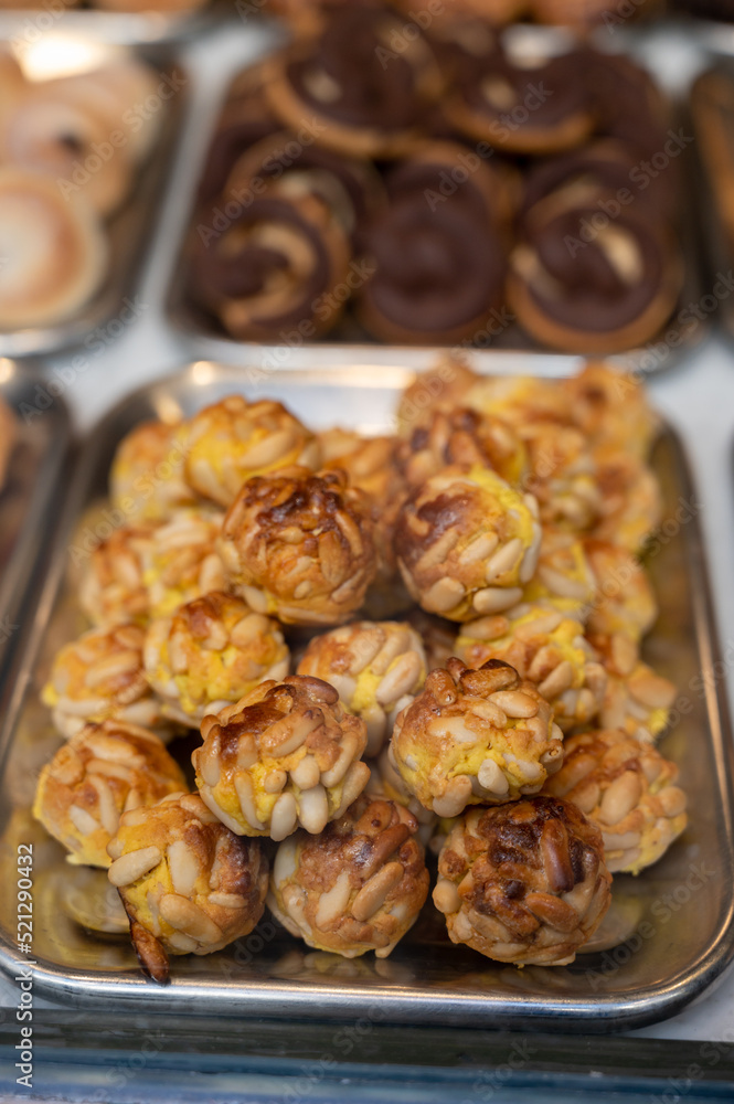 Variety of cookies and cakes on display in artisanal bakery in San Sebastian city, Basque Country, Spain Variety of cookies and cakes on display in artisanal bakery in San Sebastian city, Basque Country, Spain