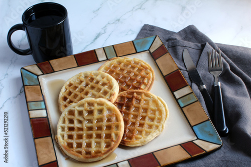 Waffles, with butter and syrup, and coffee make a nice brunch