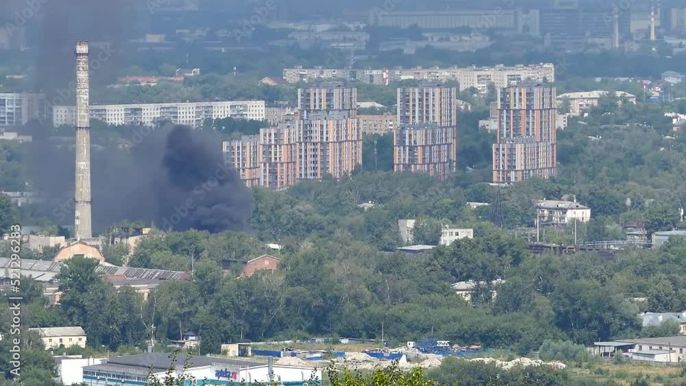 Black smoke from the fire. Explosion and fire at the plant. High quality 4k footage Black smoke from the fire. Explosion and fire at the plant. High quality 4k footage