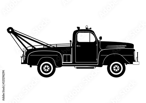 Silhouette of a vintage tow truck. Vector.