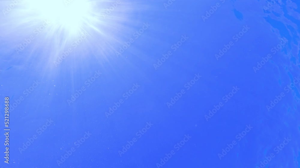 Underwater Looking up towards Sun, Slow Motion Underwater Looking up towards Sun, Slow Motion