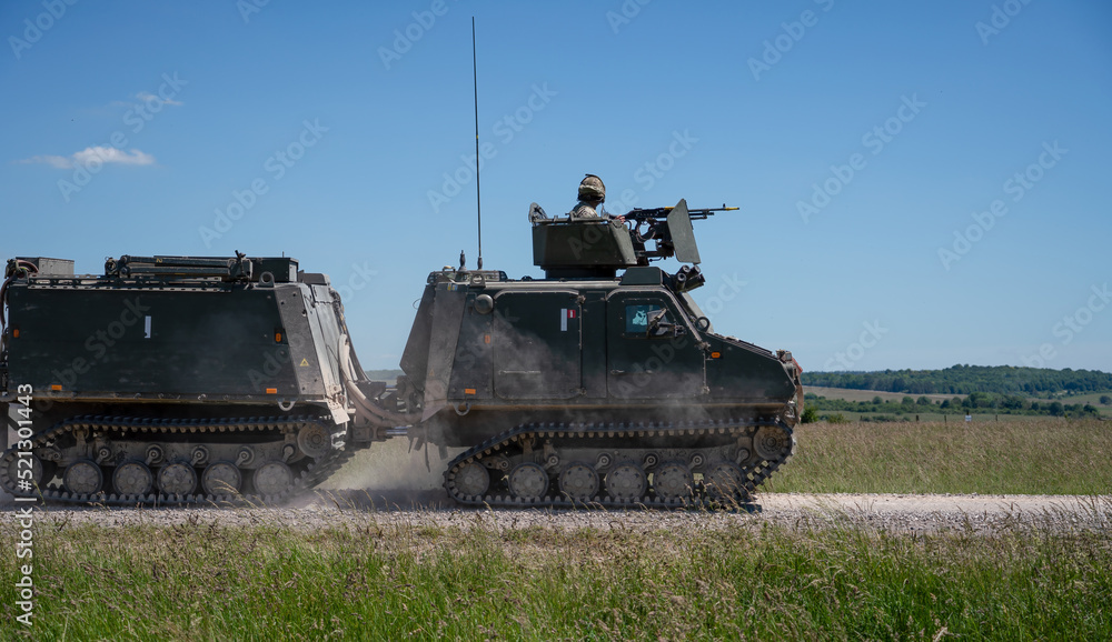 Army all terrain armoured vehicle in action on a military exercise Army all terrain armoured vehicle in action on a military exercise