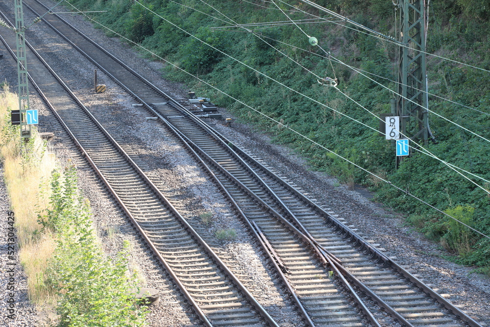 Railway tracks switch, railroad with electricity and two tracks, rails