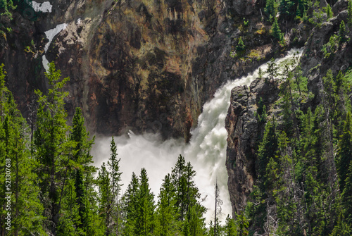 Upper Falls raging with snow melt, Yellowstone National  Park.