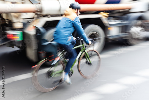 woman rides a bicycle in the city