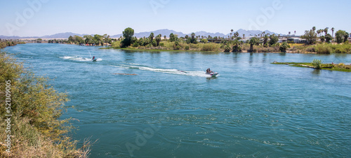 The Colorado River at Blythe, California, looking at the River from the West Bank and People Riding Jet Skis