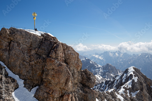 A man on the top of the snow mountain