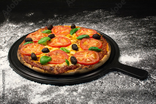 vegetarian italian Pizza with tomatoes, mozzarella cheese. Delicious italian pizza