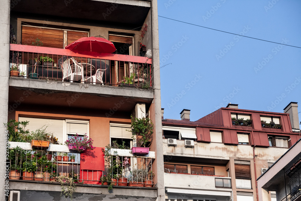 Balconies on Communist housing buildings, in decay & diplapidated condition in Belgrade, Serbia. These towers are a symbol of Socialist architecture and of economic transition Eastern Europe faced