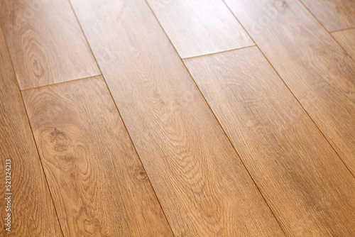 Parquet floor of the wooden planks. Wood laminate
