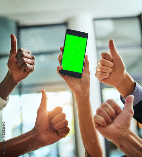 Fototapeta Naklejka Na Ścianę i Meble -  Green screen, copy space and chroma key on phone and thumbs up hand sign, gesture and symbol for website, marketing or promotion. Closeup of business people hands supporting new office networking app