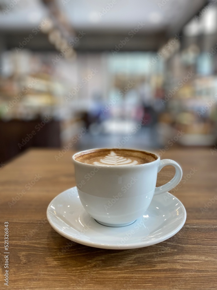 cup of coffee on table cup of coffee on table