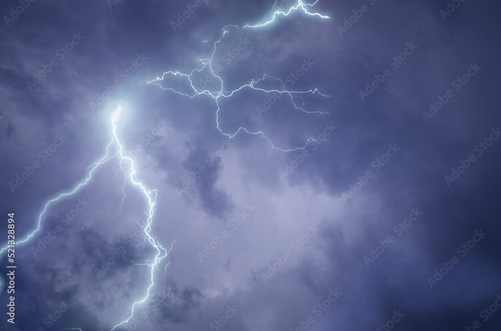 Strong eletric lightning lines in high black clouds Strong eletric lightning lines in high black clouds