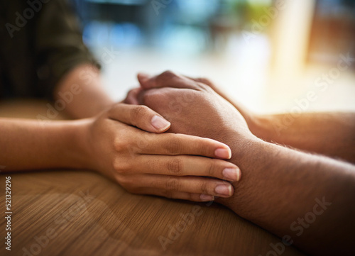 Foto Romantic, caring and in love couple holding hands, wife expressing sympathy and showing support