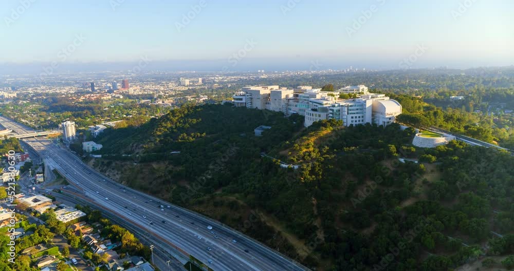 Aerial Moving Forward To The Massive Getty Research Institute Hillside Campus With A Busy Freeway In The Foreground - Los Angeles, California Aerial Moving Forward To The Massive Getty Research Institute Hillside Campus With A Busy Freeway In The Foreground - Los Angeles, California