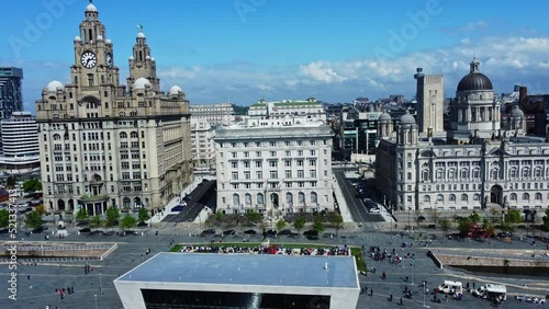 Aerial footage of Liverpool pierhead showing Liver building, Cunard building and Port of Liverpool photo