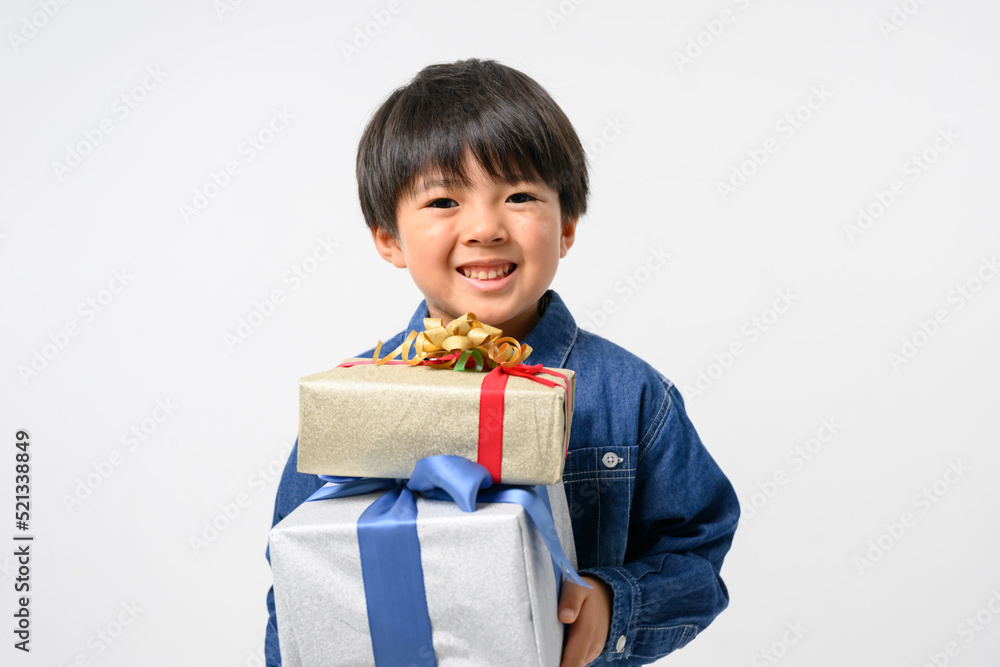 A child holding a gift A child holding a gift