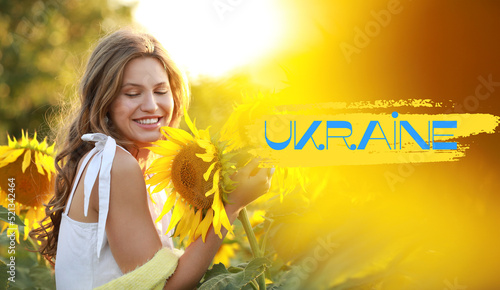 Beautiful young woman in su...