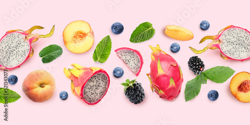 Fototapeta Naklejka Na Ścianę i Meble -  Collage of tasty fresh fruits and berries with mint leaves on light pink background