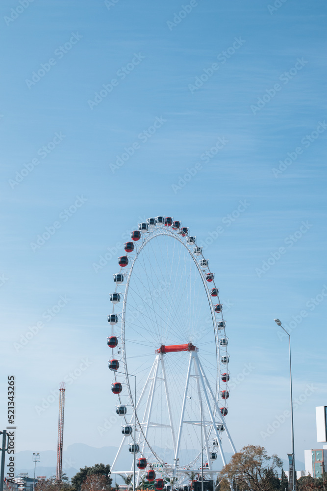 Ferris wheel in Antalya, Turkey. Vertical photo