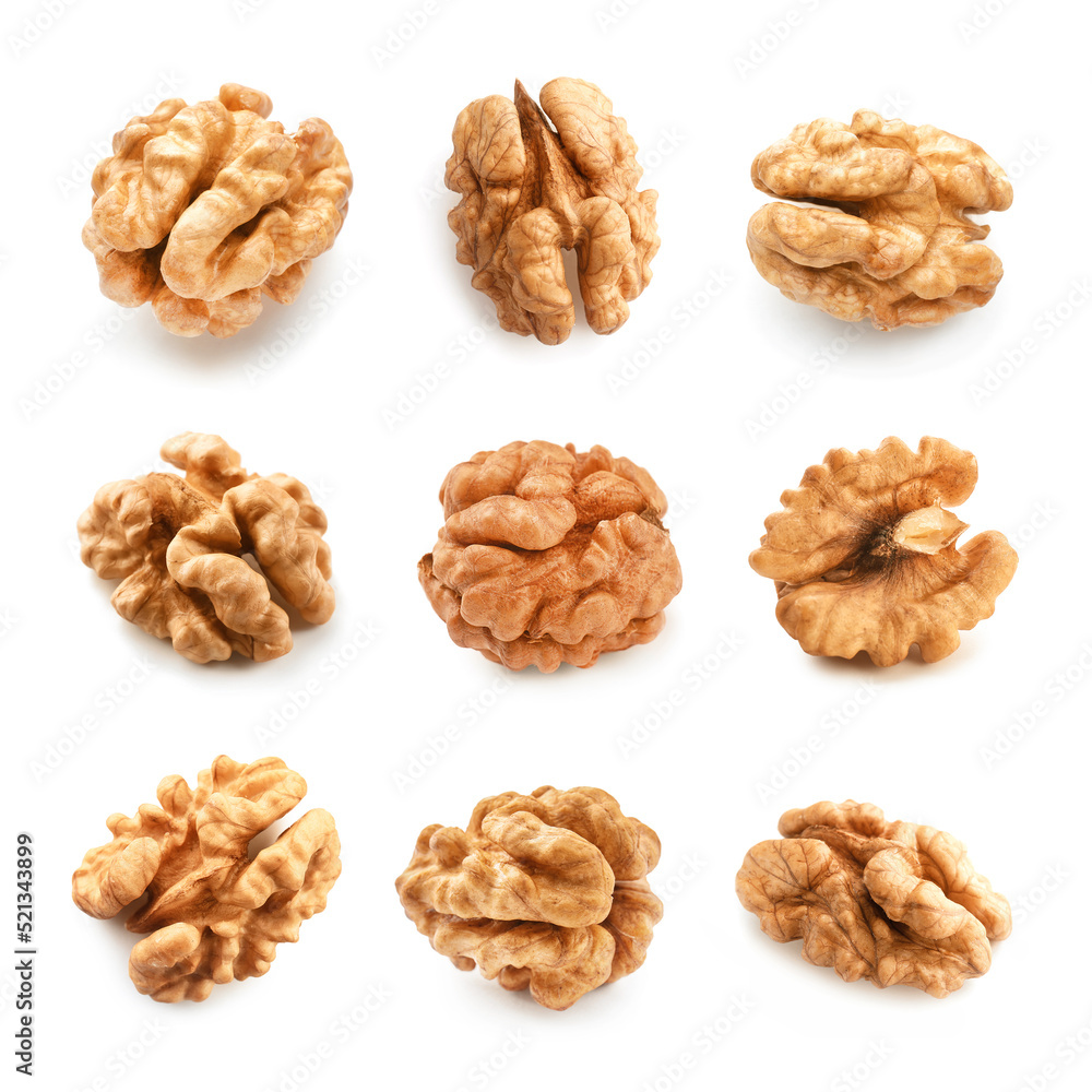 Set of tasty peeled walnuts isolated on white Set of tasty peeled walnuts isolated on white