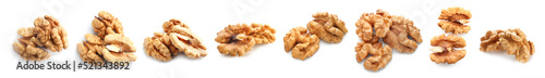 Set of tasty peeled walnuts isolated on white