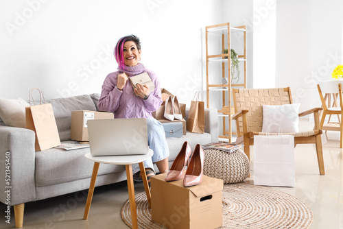 Beautiful woman with credit...