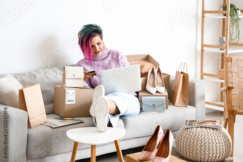 Beautiful woman with credit...