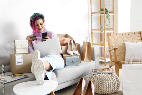 Beautiful woman with credit...