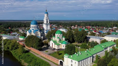 Orbital aerial shot of Uspenskaya Tikhonova Pustyn Monastery on sunny summer day. Leo Tolstoy village, Kaluga Oblast, Russia. photo