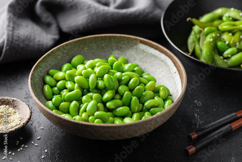 edamame beans in ceramic bowl, soybeans, selective focus photo